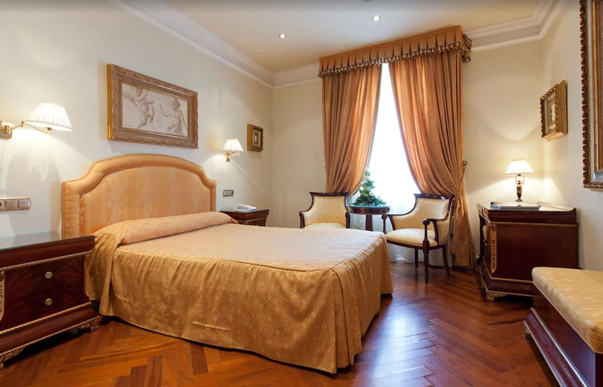 Hotel Alameda Palace Salamanca Kültér fotó A bedroom at the hotel